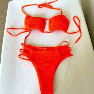 Orange Bikini Set.  Sexy. Top and Bottom Adjustable top.  Size XS. NWT